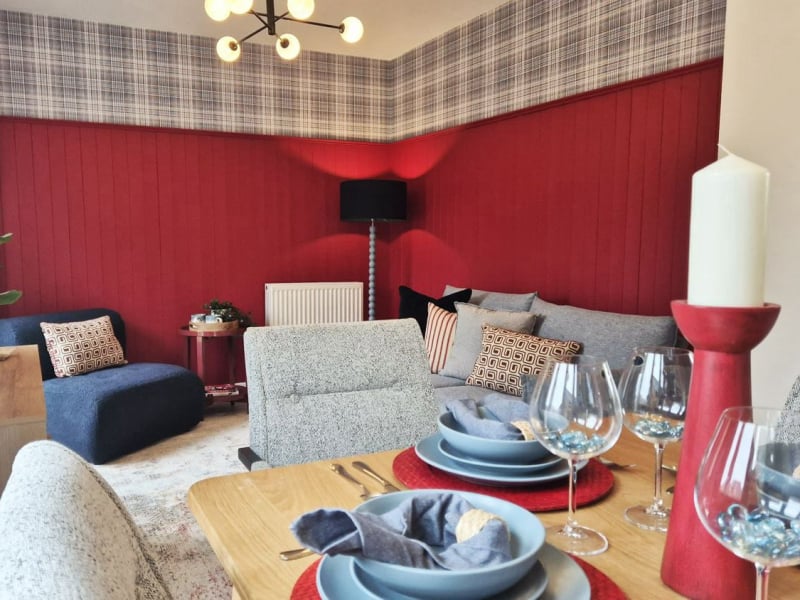 vibrant show home family lounge diner in reds and blues